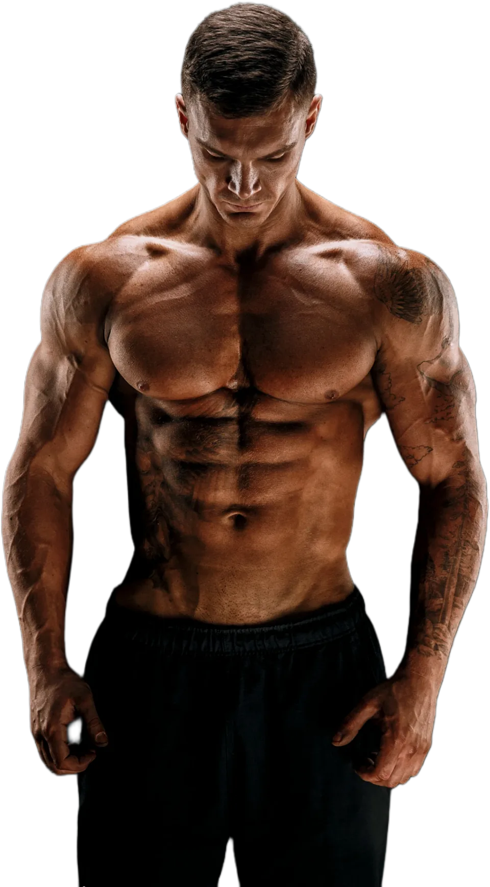Muscular athlete in warm, dramatic lighting